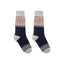 Pair of navy blue socks with a patterned cuff on a white background