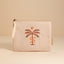 stone pouch with embroidered palm tree with sun and snake