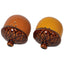 Two ceramic acorn-shaped salt and pepper shakers on a white background