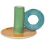 Ceramic cat toy with green cylindrical piece, blue ring, and orange circular base on a white background