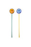 Two colorful glass stir sticks on a white background