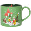 Green mug with Christmas-themed design featuring gnomes, mushrooms, and a tree.
