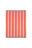 Striped towel with orange and pink vertical stripes on a white background