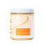 Jar of scented candle with persimmon ginger fragrance on a white background