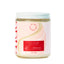 Scented candle jar with a visible label on a white background