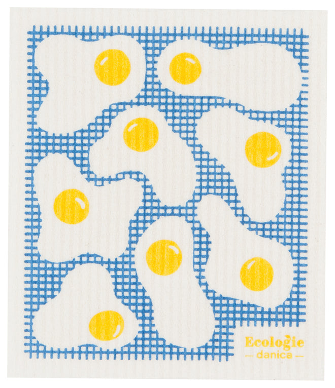 fried eggs on blue background sponge cloth