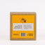 Tea infuser packaging with yellow label and brown cardboard back on a white background