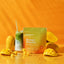 Mango Matcha product with mangoes and a drink on an orange background