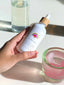 person holding bottle