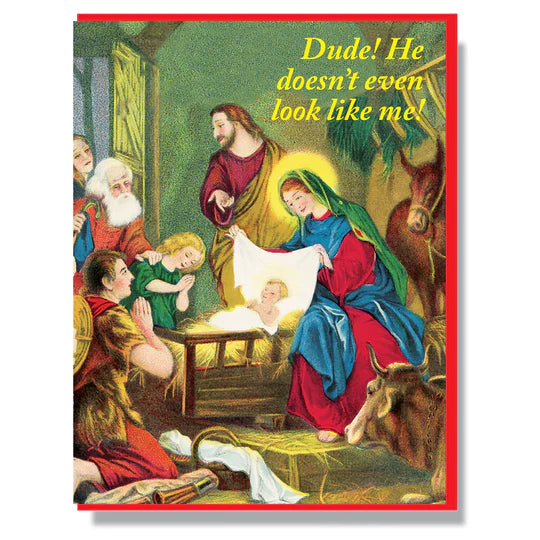 Joseph in manger pointing at baby Jesus 