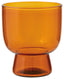 Orange glass with a wide base and narrow top on a white background