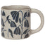 Ceramic mug with blue floral patterns on a white background