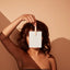 women holding laundry strip