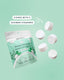 Packaging of Naturebee shower steamers with scattered steamers on a light green background