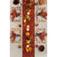 Decorative Thanksgiving table setting with a red runner, fall-themed place mats, and centerpieces.