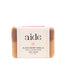 Bar of soap with 'aide' branding on a white background