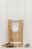 Bag of Chai Caramels with a label on a white background