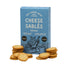 Box of Pea Green Boat Cheese Sablés with crackers on a white background