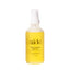 Yellow bottle of aide moisturizing body oil on a white background