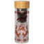 Clear glass tumbler with fox design and wooden lid on a white background