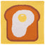 Knitted square with a design of a slice of bread with an egg on it against a yellow background