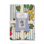 Tea towel with botanical design and striped pattern, displayed against a white background.