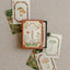 Playing cards with mushroom designs on a textured surface
