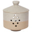Beige ceramic garlic keeper with a lid on a white background
