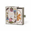 The Living Herbarium Playing Cards deck by Roomytown, shown in its illustrated storage box with one card deck partially slid out. The packaging features vintage botanical illustrations of flowers and leaves on a cream and green gingham background.