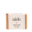 Bar of soap with 'aide' branding on a white background