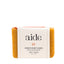 Bar of soap with 'aide' branding on a white background