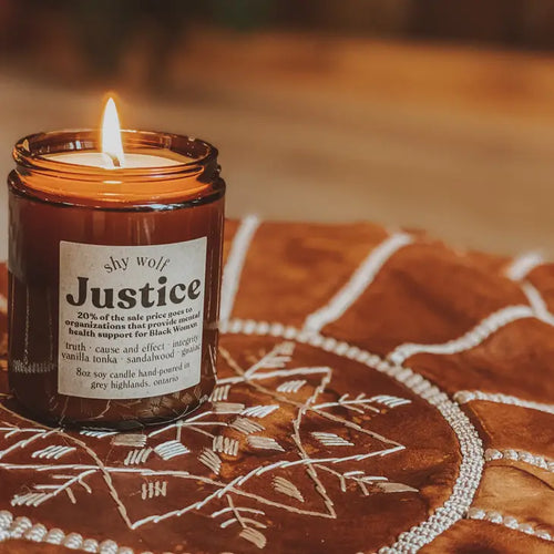 justice candle by shy wolf