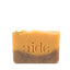 Bar of soap with 'aide' branding on a white background