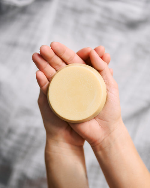 lotion bar in hands 