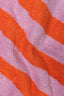 Close-up of pink and orange striped fabric texture