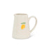 White ceramic pitcher with a lemon design on a white background