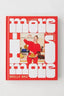 A hardcover book titled "more i more s" by Molly Baz, featuring a bold red cover with large white typography and a central photo of a woman in a red outfit holding a plate of pizza.