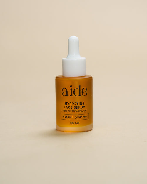 face serum bottle by Aide Bodycare