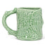 Green textured mug on a white background