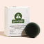 Good Juju nourishing conditioner bar with packaging on a light pink background