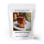 A white stand-up pouch of Maison Zoe Ford Salted Caramel Doughnut Pancake mix, featuring a central label with a photo of syrup-drizzled pancakes on a white plate.