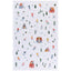 Patterned tea towel with skiers, houses, and trees on a white background