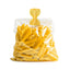 Bag of yellow pasta on a white background