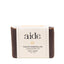 Bar of soap with 'aide' branding on a white background