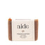 Bar of soap with 'aide' branding on a white background