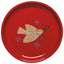 Red plate with a bird design and snowflakes on a white background